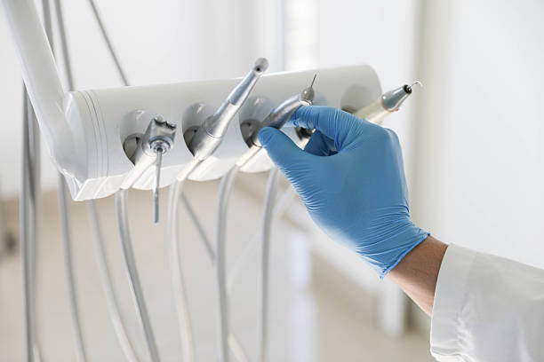 Professional Tooth Extraction technician working in Hemlock, MI